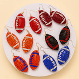 SP Sophia Collection - Two-Tone Rhinestone Pave Football Dangle Earrings: Orange