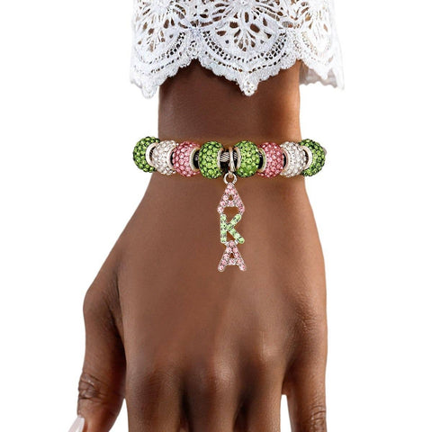 PinktownUSA - AKA Sorority Greek Charm Cable Bangle Bracelet: Color: Pink and Green / Plating: Rhodium / Size: Adjustable
